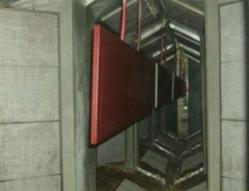 Powder coat wood parts through the cure oven